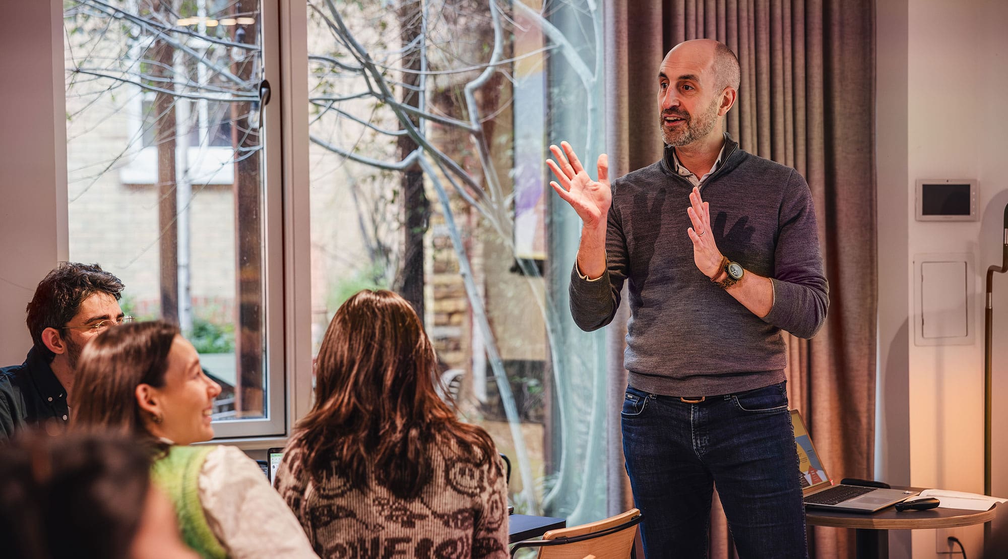Paul Lewis presenting an idea